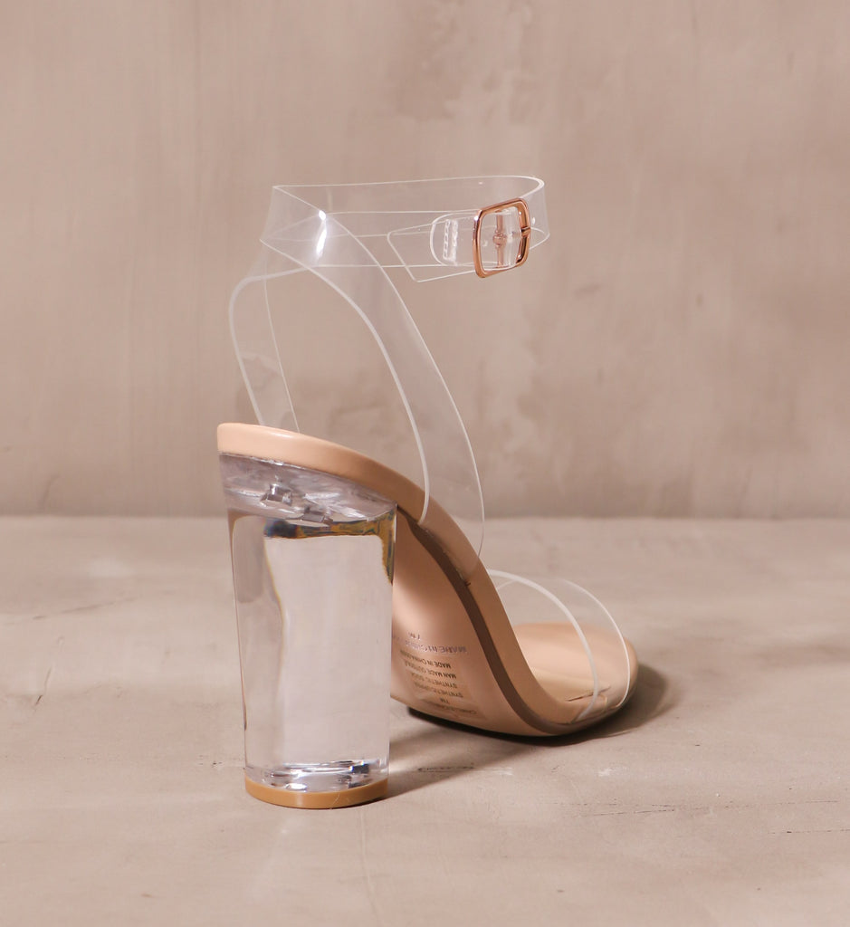 back of the clear block heel and transparent ankle strap on the home before midnight heel