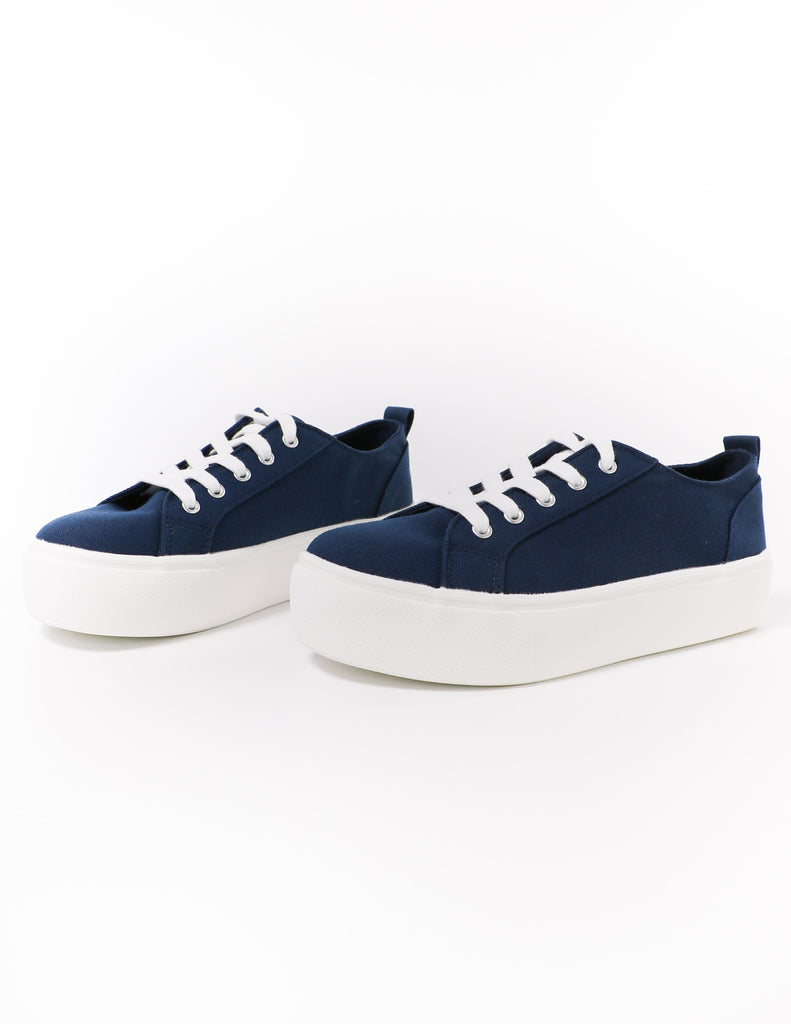 navy lace take it slow sneaker with white laces and platform