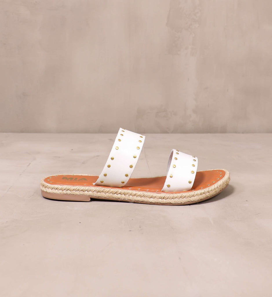 outer side of the let the stud times roll sandal with two straps with stud details