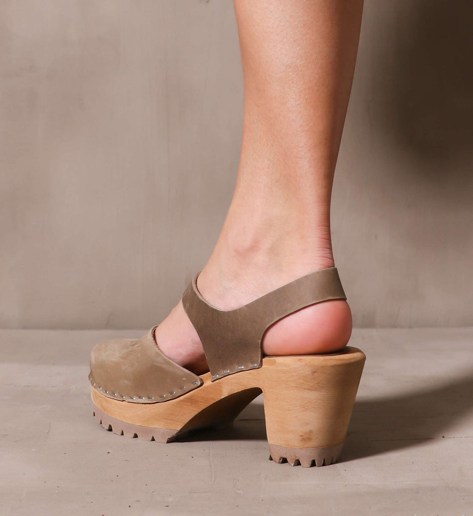 back of the solid block wood heel with the taupe leather upper