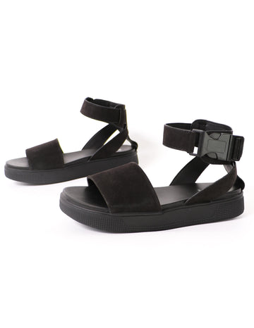 close up of the black mia buckle trouble platform rubber sole sandals on white background - elle bleu shoes