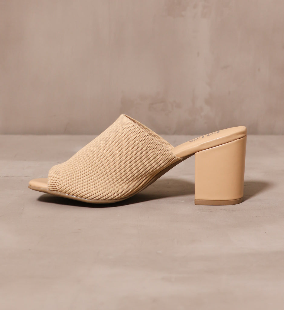 inner side of the scandinavian style textile sandal heel with silp on silhouette and open toe