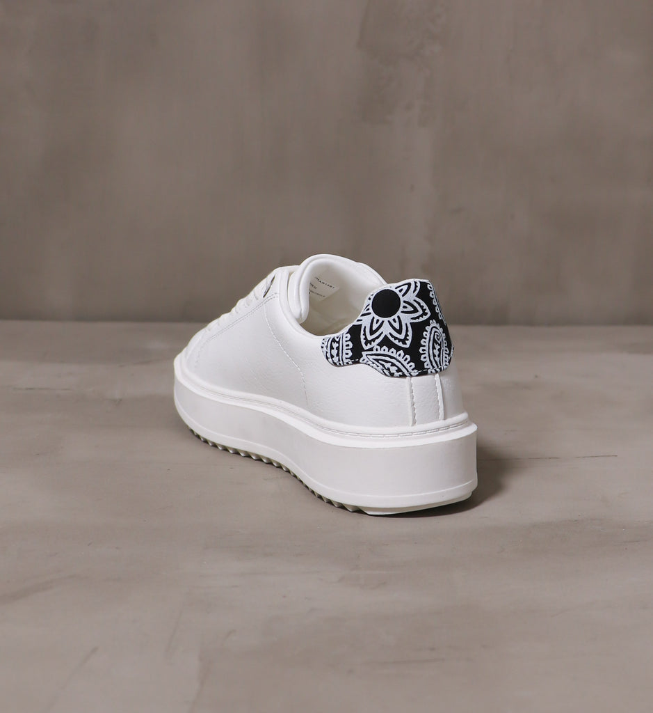 back of the pais-lead the way sneaker with black and white paisley fabric detail