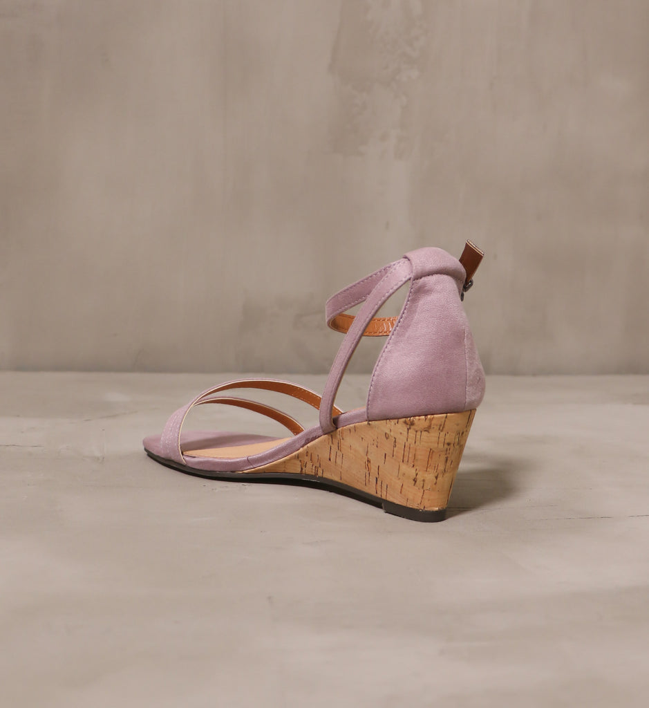 back of the cork wedge heel on the lavender pastel me you love me wedge sandal
