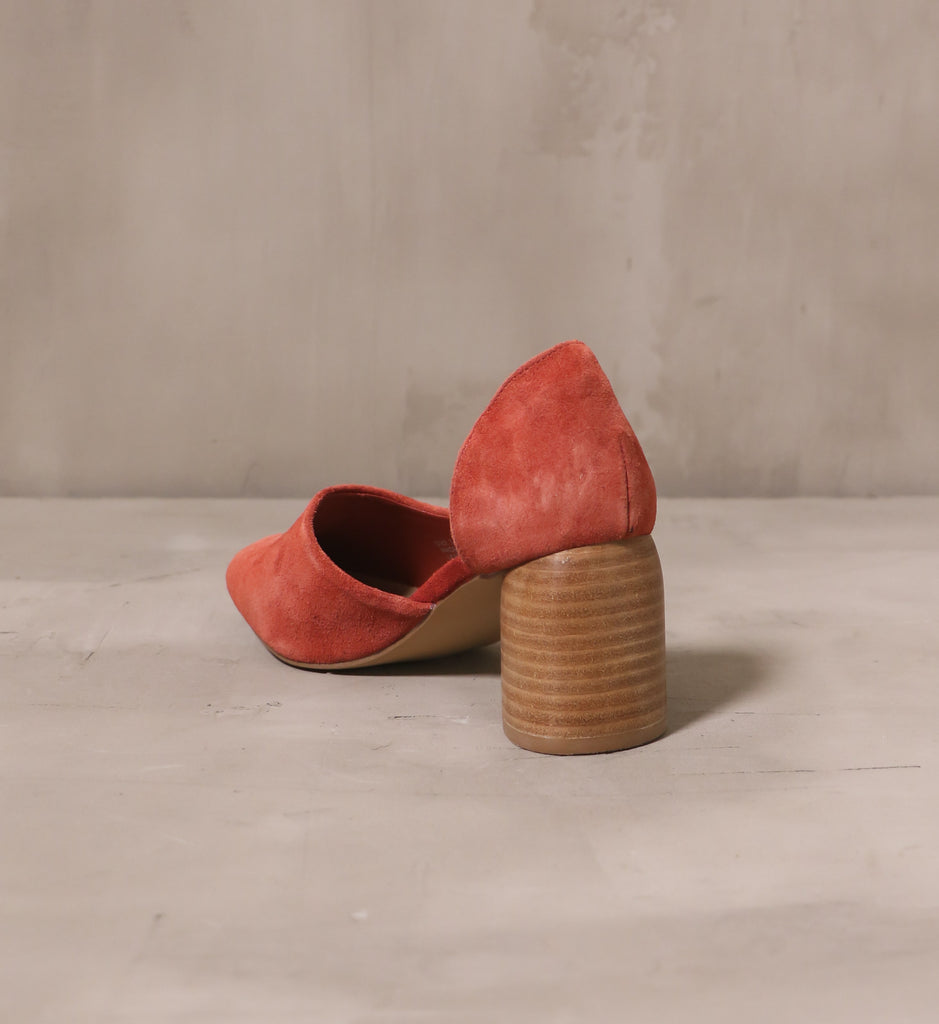 back of the teardrop shaped stacked wood heel and rust upper on the retro romance heel