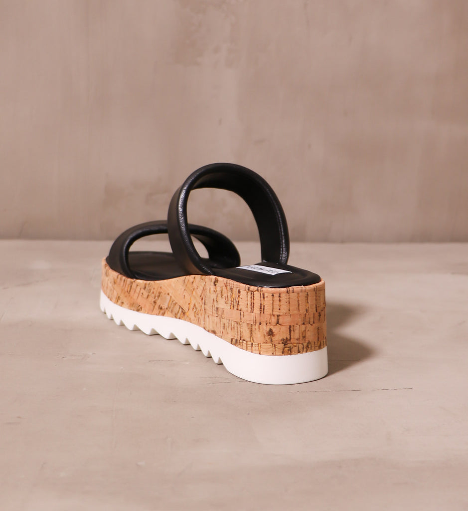 back of the open back sole purpose platform sandal with chunky cork platform and white tread