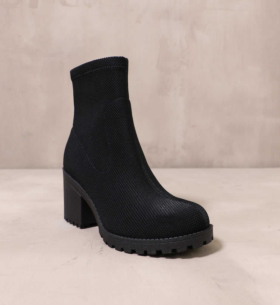 front of the round toe fabric upper on the all black stellar phenomena boot