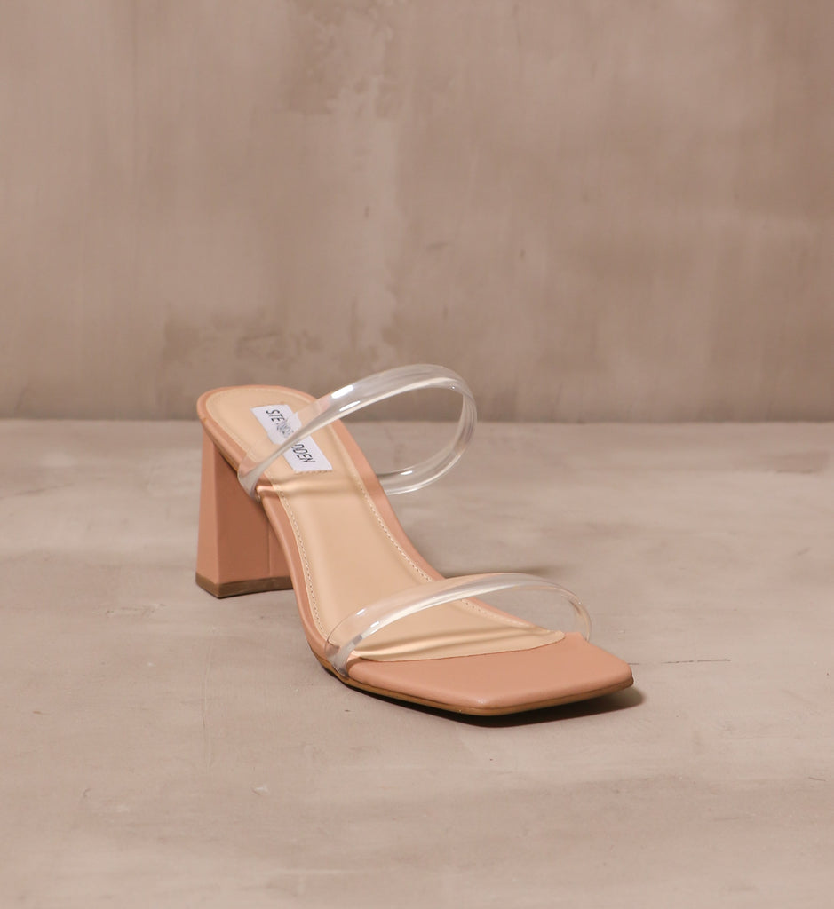 front of the transparently timeless heel with tan square foot bed and leather insole