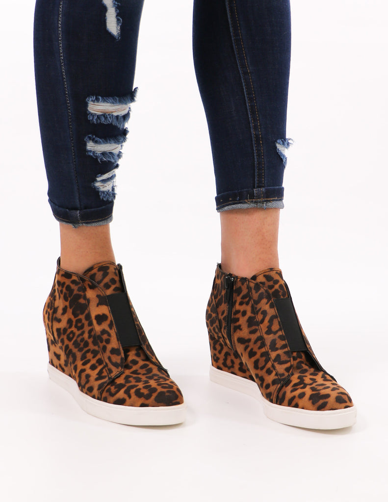 model standing in leopard power player soda sneaker wedge - elle bleu shoes