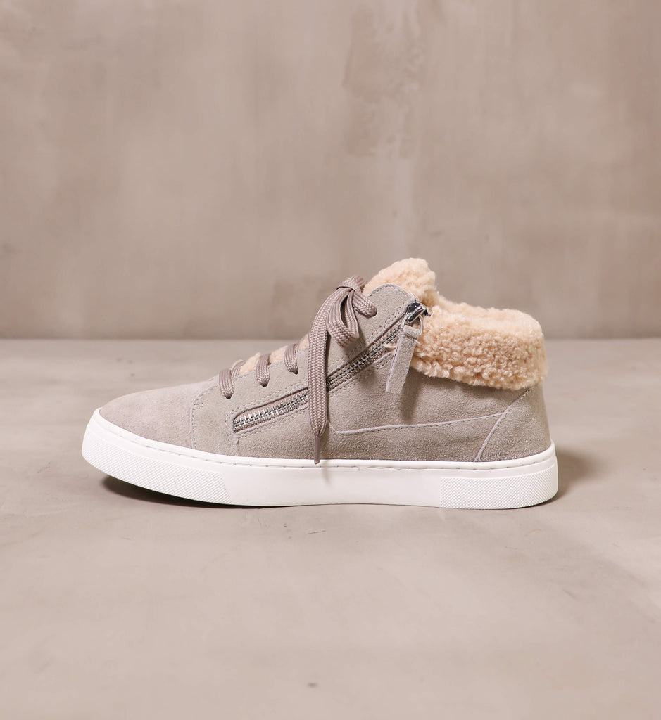 inner side of the taupe suede warm feelings sneaker with taupe laces and silver zipper