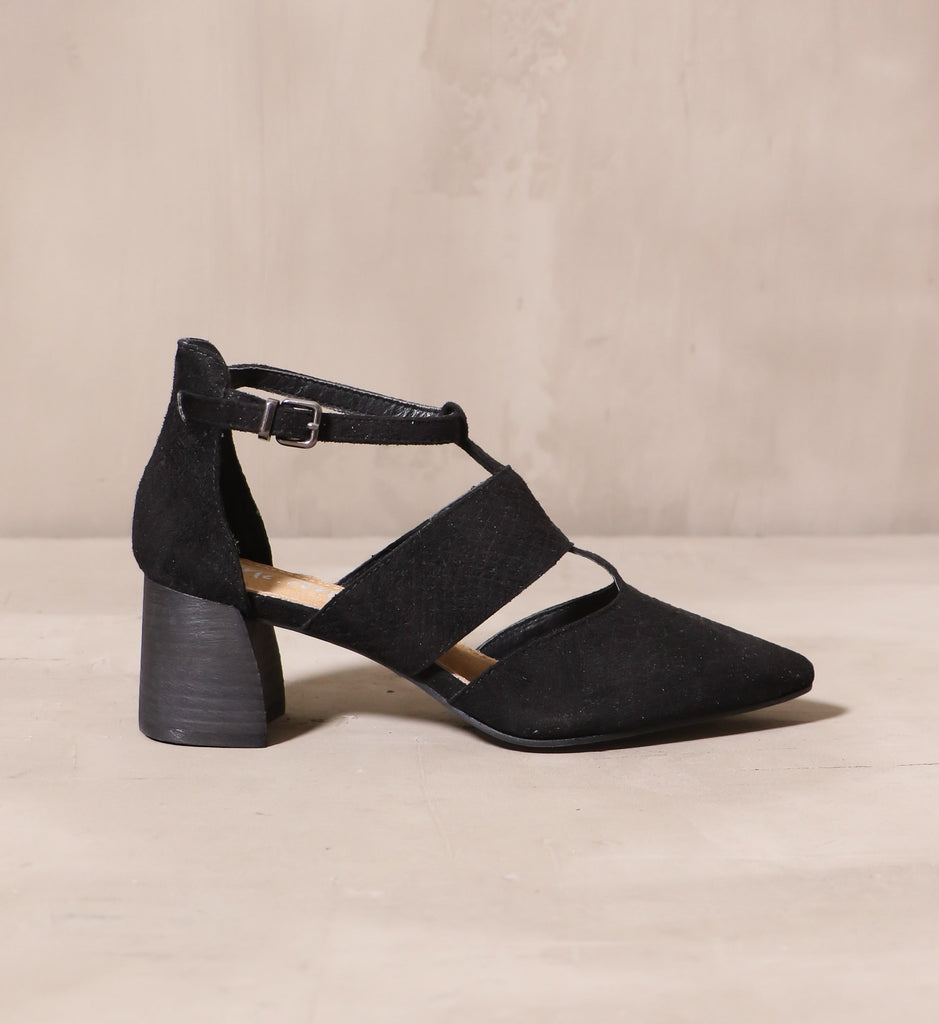 outer side of the wine and dine block heel with textured suede upper and cutout details