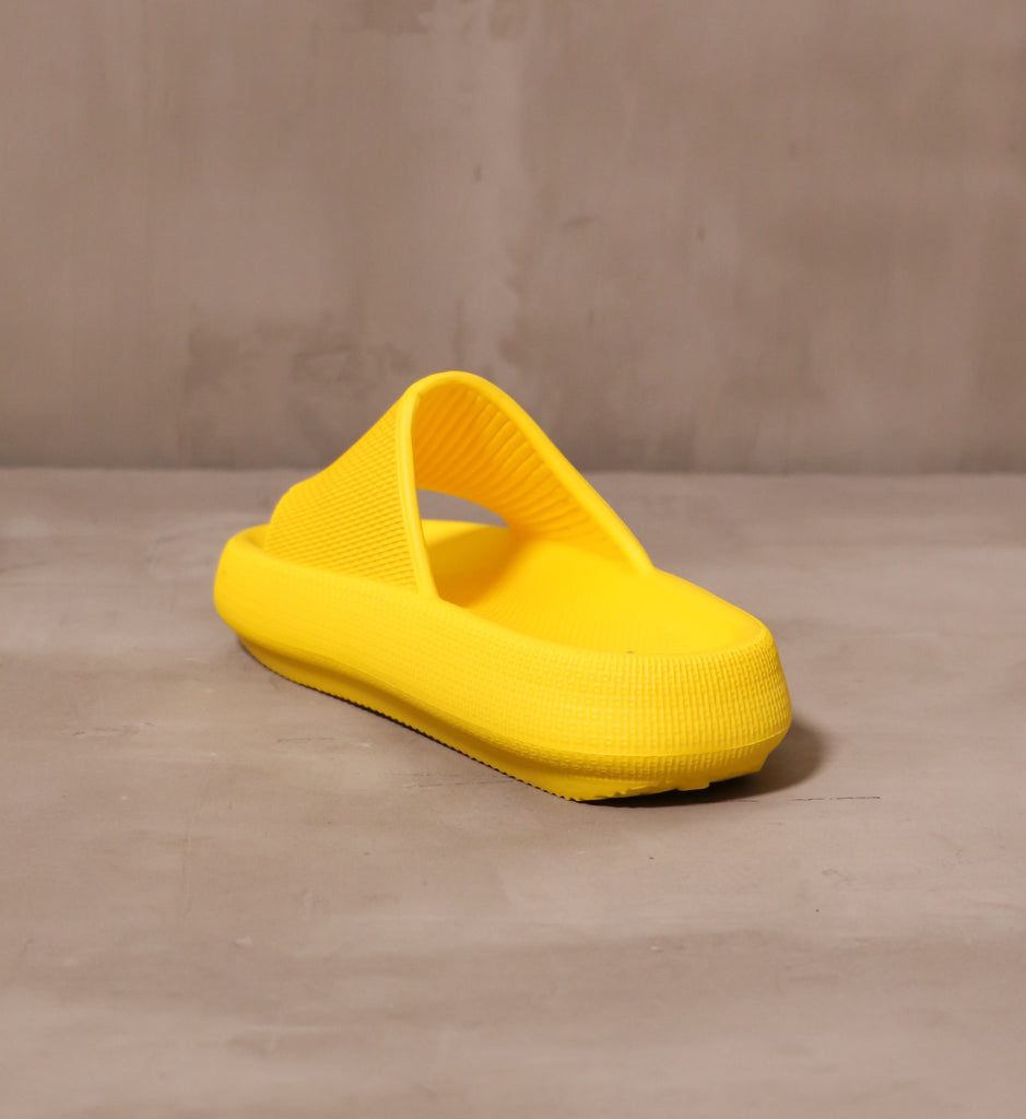 open back slip on design on the yellow mia late to the foam party pool slides